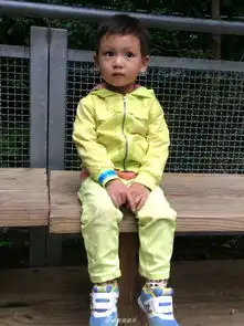 组图田亮儿子小亮仔婴儿照曝光大眼水汪汪皱眉变表情包超可爱